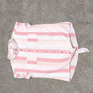 Women's short sleeve, button down top with tie knot.